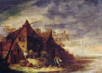 Frau vor einem Cottage